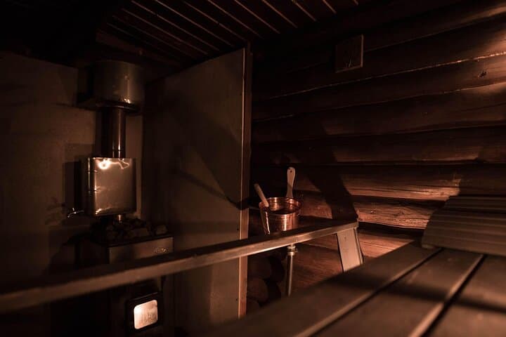 Private Lappish evening in the wilderness with traditional sauna and dinner