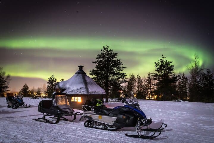 Levi Northern lights by snowmobile