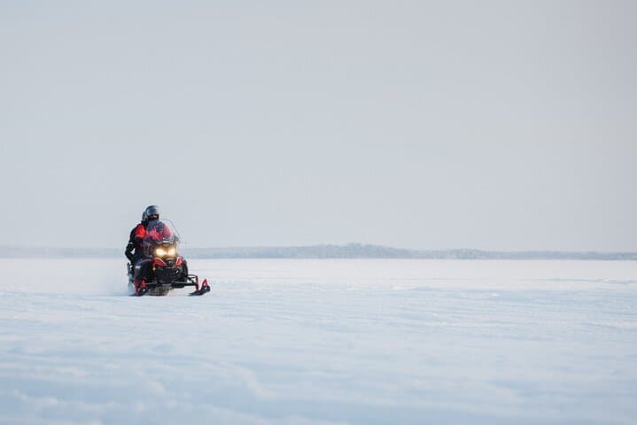 Two hours Snowmobile Safari Driving into Lappish Forests