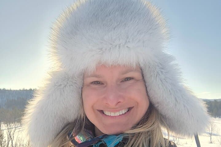 Authentic Ice Fishing by Sledge in Lapland