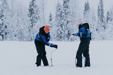 Ice Fishing by Snowmobile in Levi