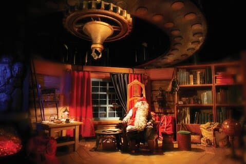 A magical moment captured as Santa Claus eagerly anticipates meeting his guests at Santa Claus Village, situated at the Arctic Circle in Rovaniemi.