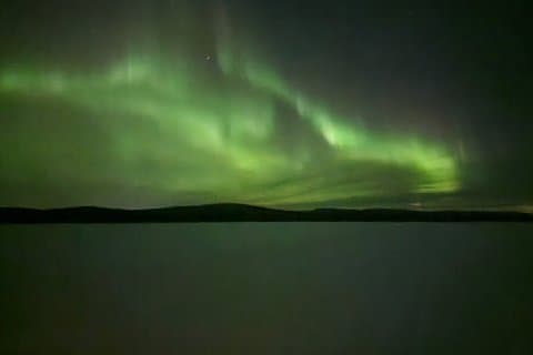 Aurora Borealis on Lake Inari Snowmobile Night Tour