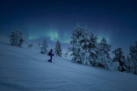 Ylläs Night Snowshoeing up a Fell to Hunt the Aurora