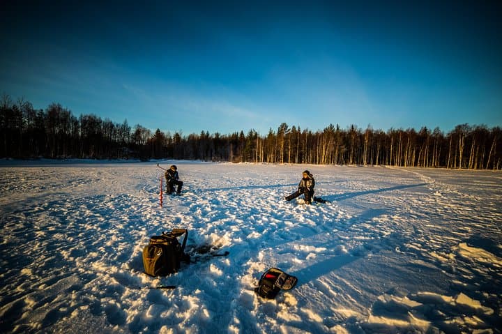 Ice Fishing by Snowmobile from Rovaniemi