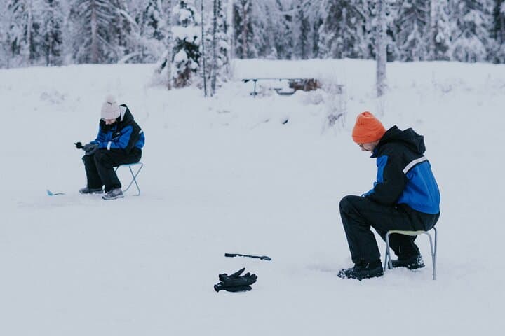Ice Fishing by Snowmobile in Levi