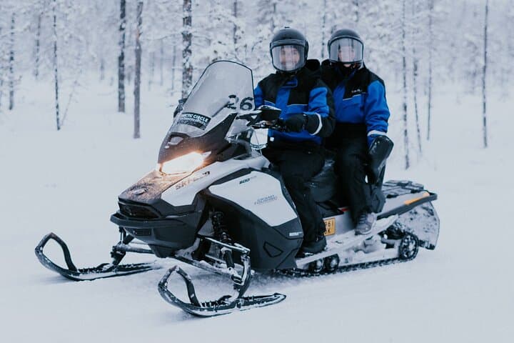 Ice Fishing by Snowmobile in Levi