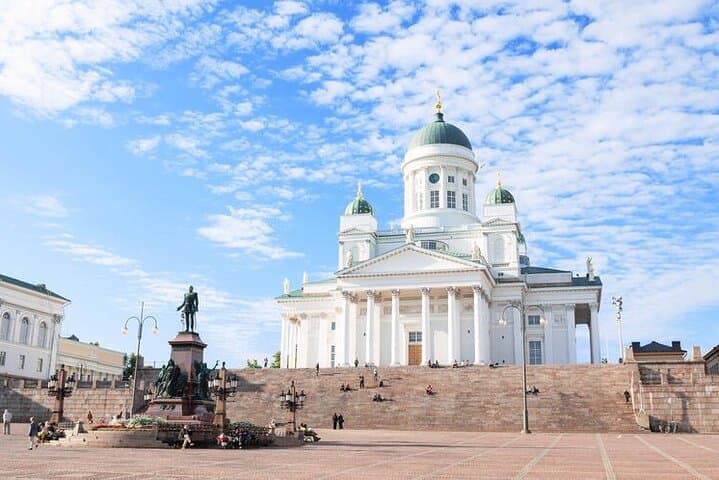Helsinki Cathedral is a neoclassical white church with green domes, overlooking Senate Square. Completed in 1852, it’s one of the city’s most iconic landmarks.