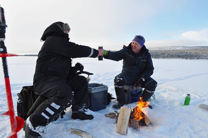 Ice fishing Day in Lapland