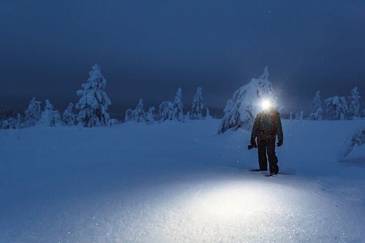 Skiing in Riisitunturi National Park at Night Wilderness Dinner