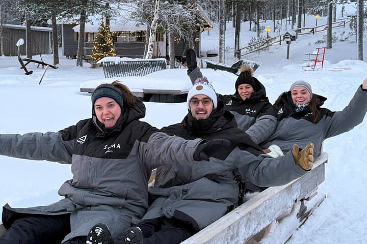 Reindeer Husbandry with Snowmobile Sleigh Ride and Cabin Lunch