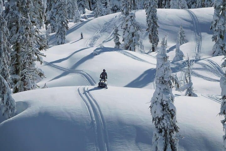 Private Snowmobile Safari with Riverside Sauna