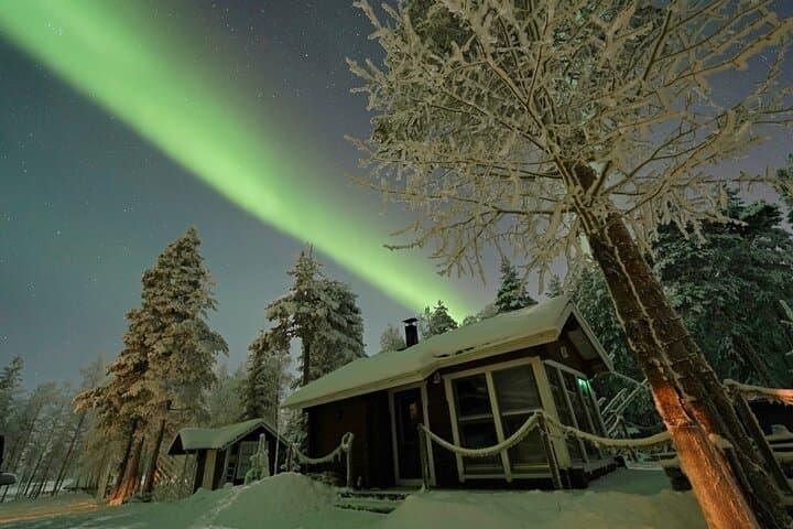 Northern Lights Hunting in Lappish old cottage