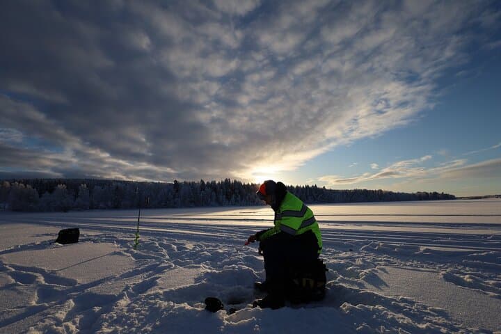 Ice Fishing and Winter BBQ Experience in Finnish Wilderness