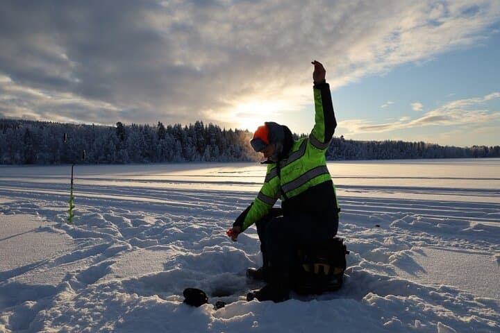 Ice Fishing and Winter BBQ Experience in Finnish Wilderness