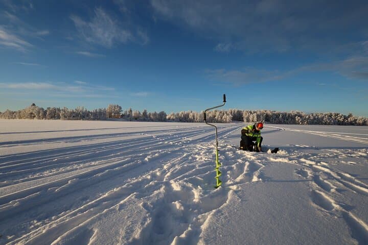 Ice Fishing and Winter BBQ Experience in Finnish Wilderness