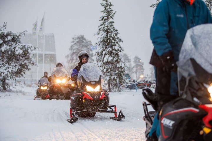 Snowmobile Safari into the Arctic Circle Forest