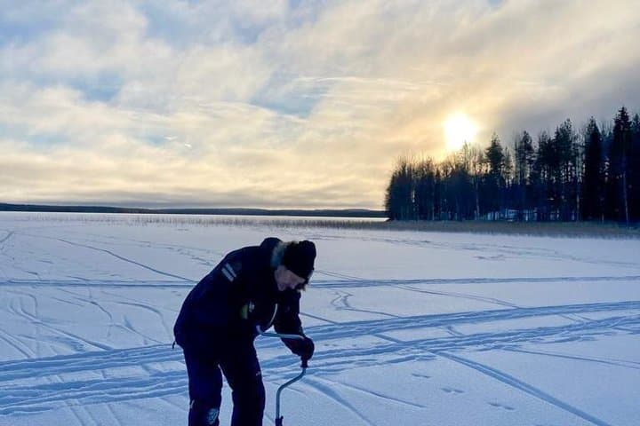 Discover Arctic Ice Fishing in Rovaniemi