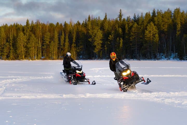 Snowmobile Safari through Lappish Forest from Rovaniemi