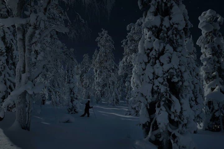 Ylläs Night Snowshoeing up a Fell to Hunt the Aurora